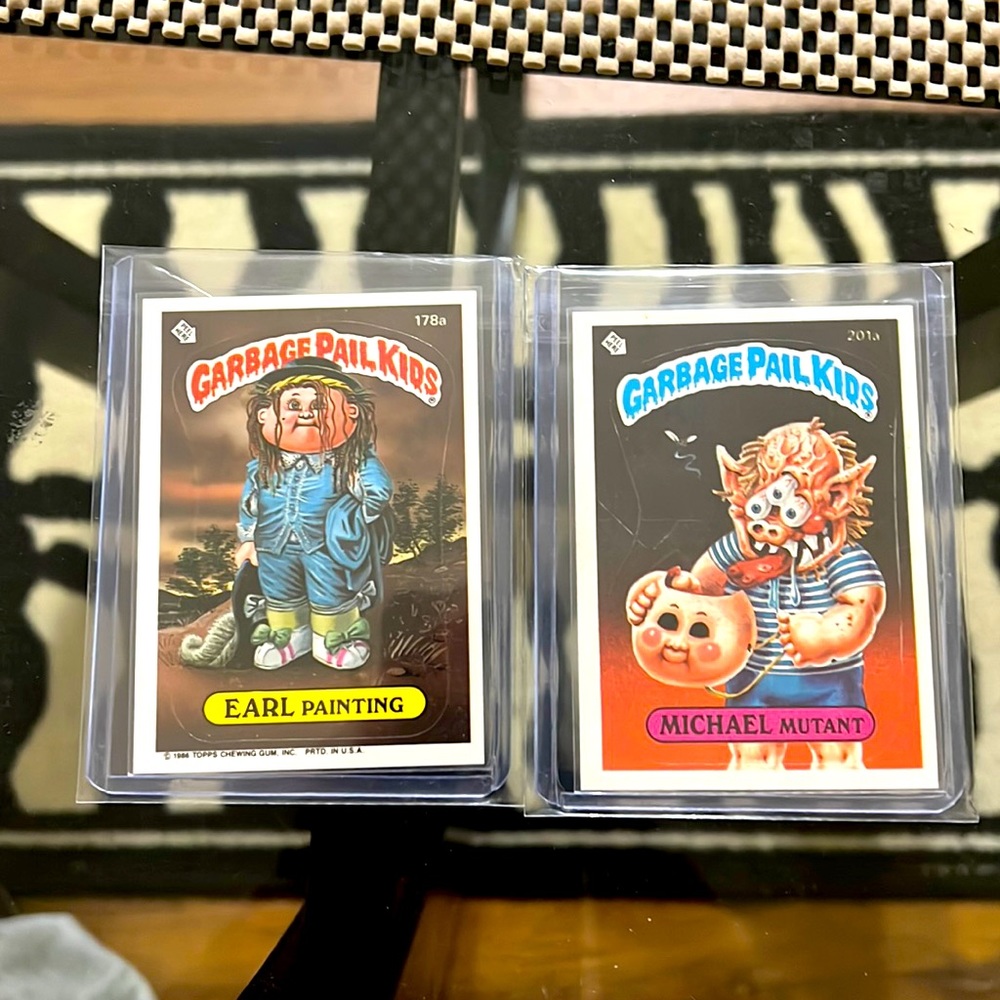 Topps garbage pail kids trading cards.